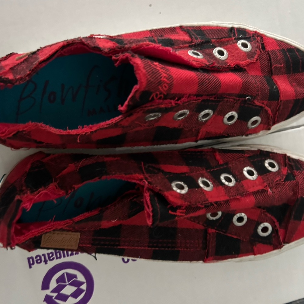 Blowfish slip on sneakers. No lace style. Slightly worn. 2 to 3 times.  Size 9